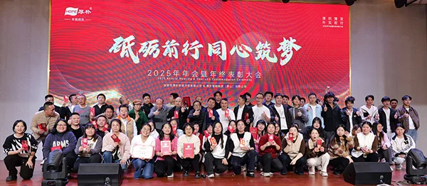 all employees took a group photo